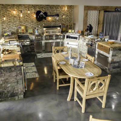 Outdoor ovens and dining furniture on display in store