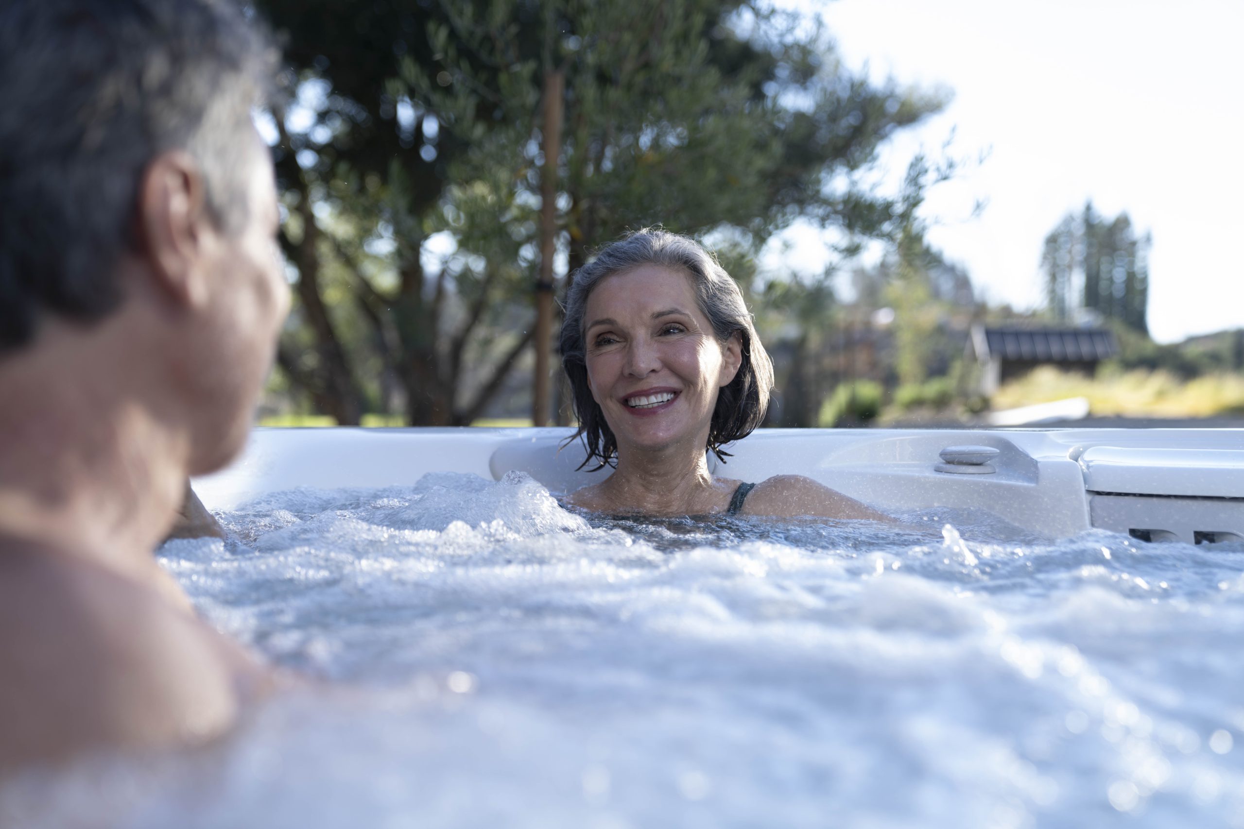 couple relaxing in hot tub